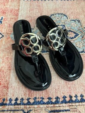 Kelly & Katie Black Patent Sandals with Gold-Tone Medallions